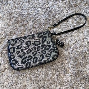 Coach black/grey metallic cheetah print wristlet